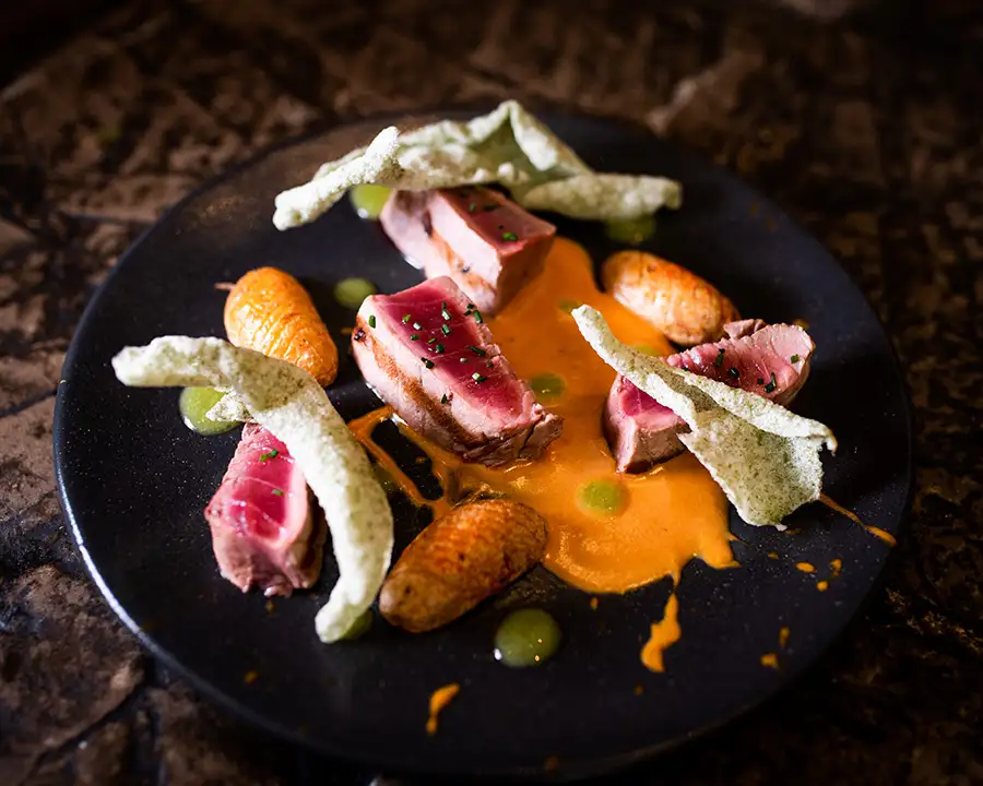 a plate of fresh fish, the ingredients of which have been carefully selected by Atxa restaurant and cooked to perfection