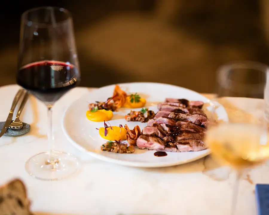 Presentation of a bottle of Coloma wine, selected and labelled by Atxa restaurant